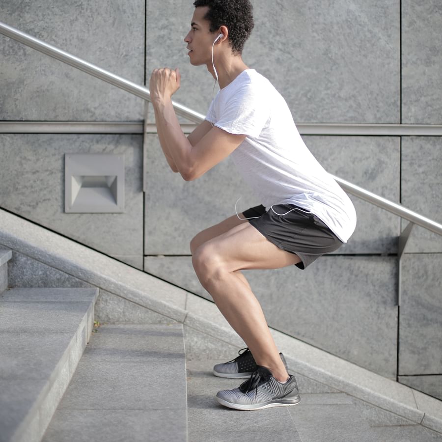 Person setting up a virtual reality fitness system